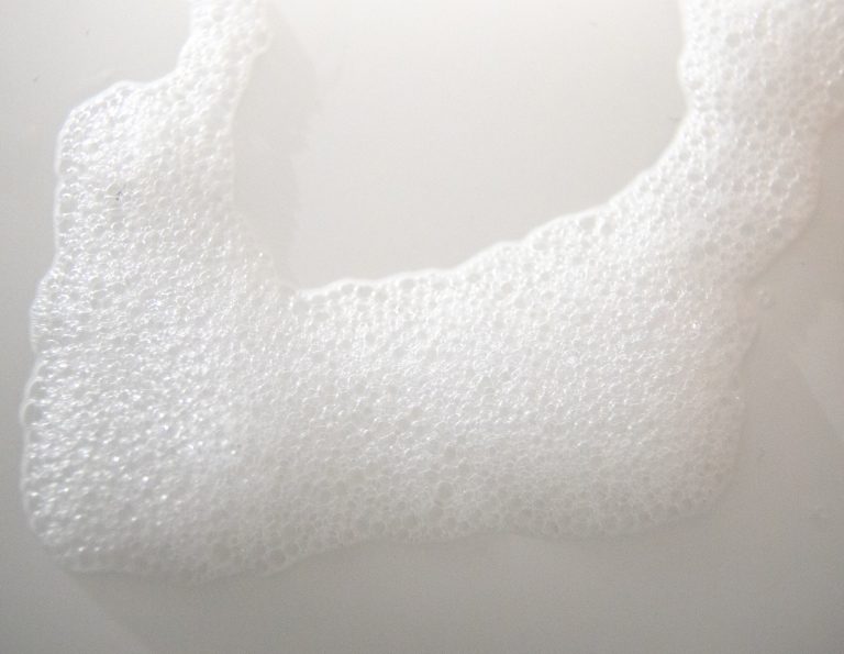 Antifoaming agents for woven and knitted fabrics